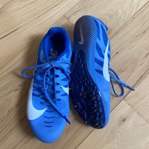 Nike spike running shoes.  GUC